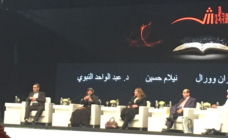 University of Birmingham staff on stage talking about the Birmingham Qur'an at a panel discussion at Sharjah Book Fair 2017.