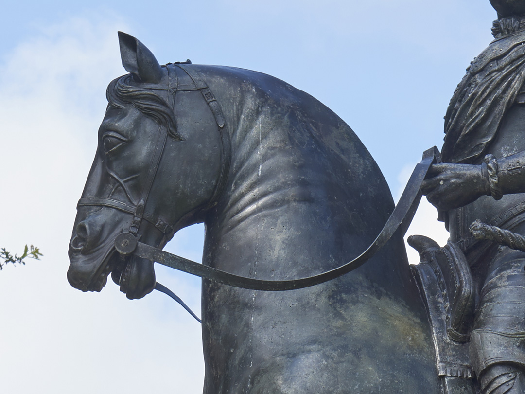 Close up detail of bronze sculpture of King George I on Horseback by John Nost II including horse head and reins