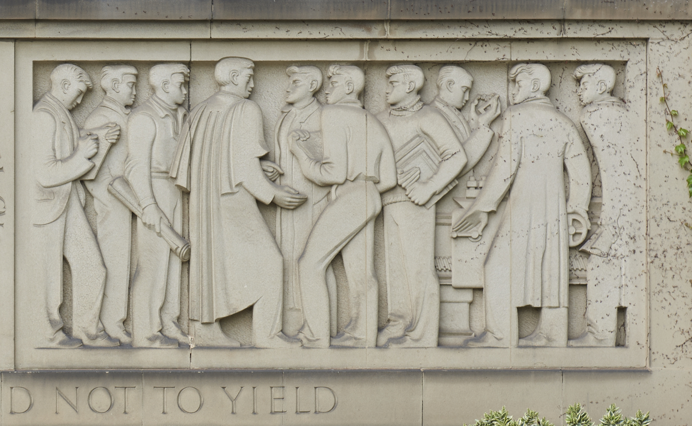 Close up detail of right side of stone carved Engineering Frieze by William Bloye showing ten men stood in a row
