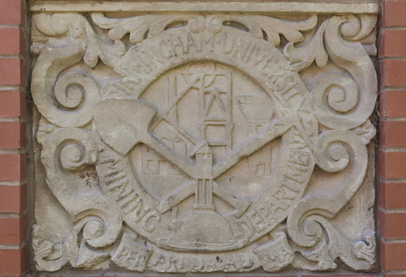 Carved stone heraldic shield from the Mining Department
