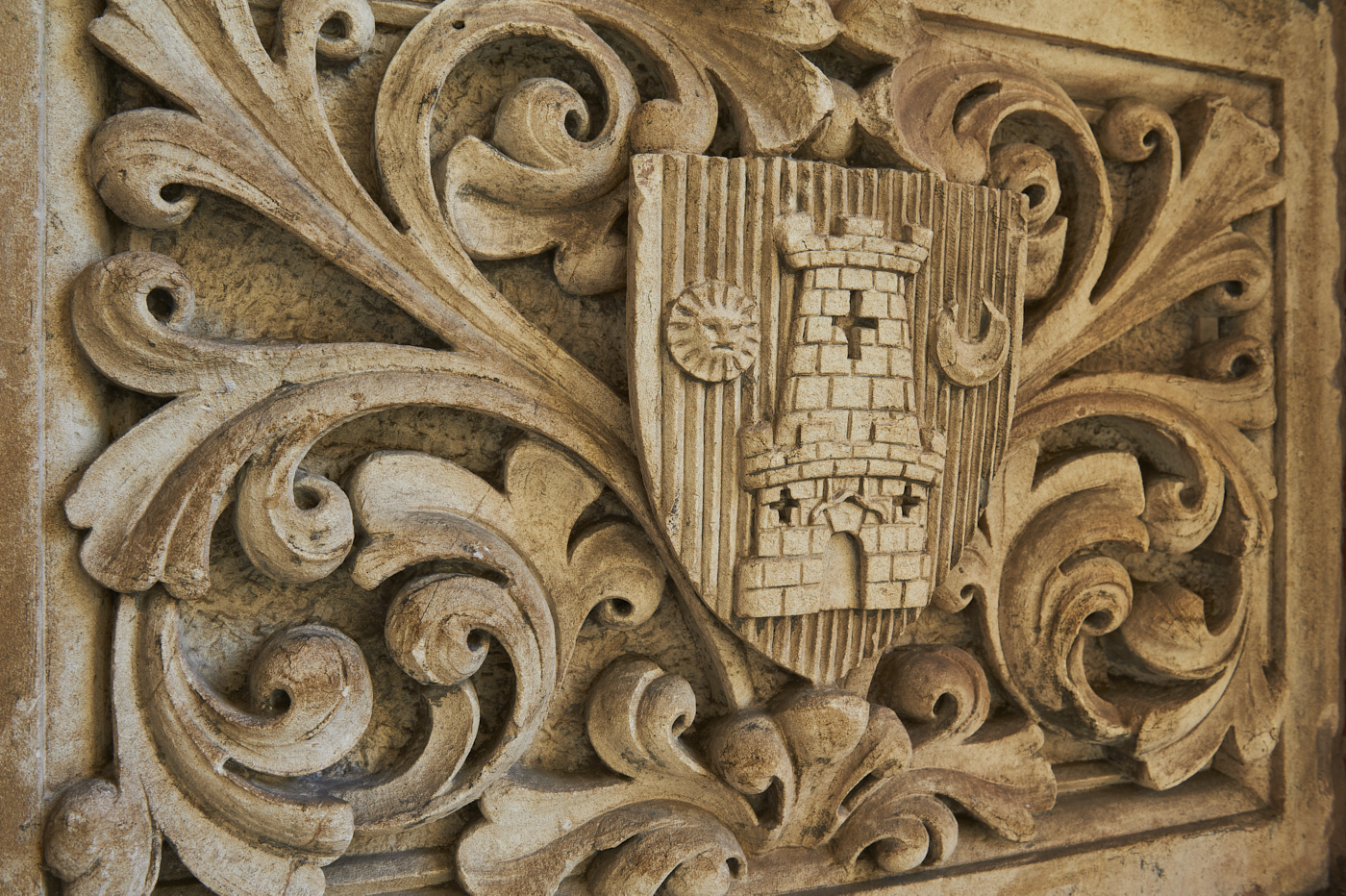 Detail of one of stone, carved plaques from Heraldic Shield from Mason College