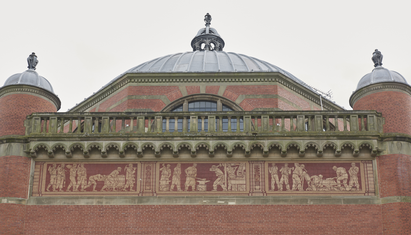 Civil Engineering ceramic frieze by Robert Anning Bell with domes of Aston Webb Building above
