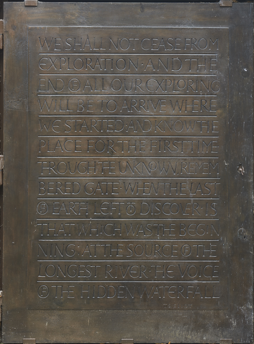 Detail of carved bronze Pump Room Door by Betina Furnee featuring inscription of poetry by T.S Eliot