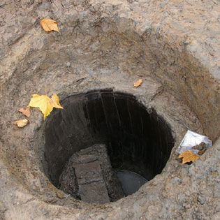 a photo of an archaeological cess pit