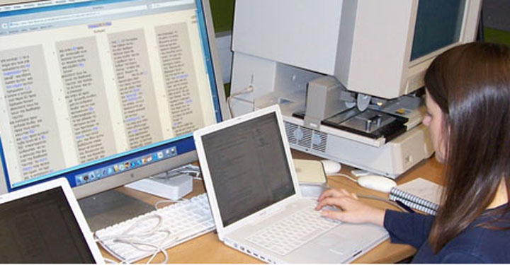 A researcher working on a computer at ITSEE