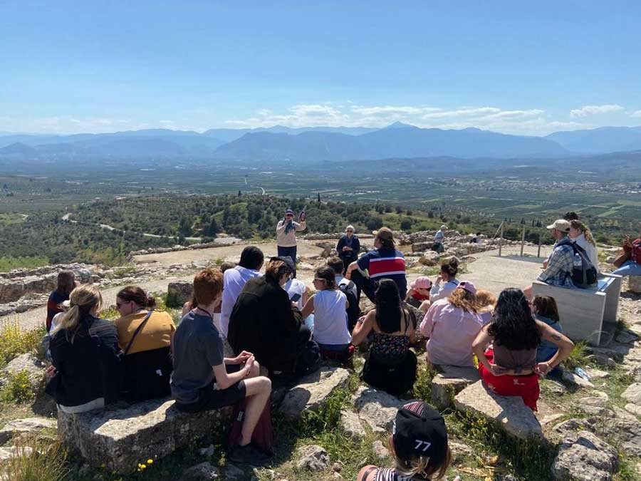 Students listen to a lecture by Dr Maeve McHugh at Mycenae