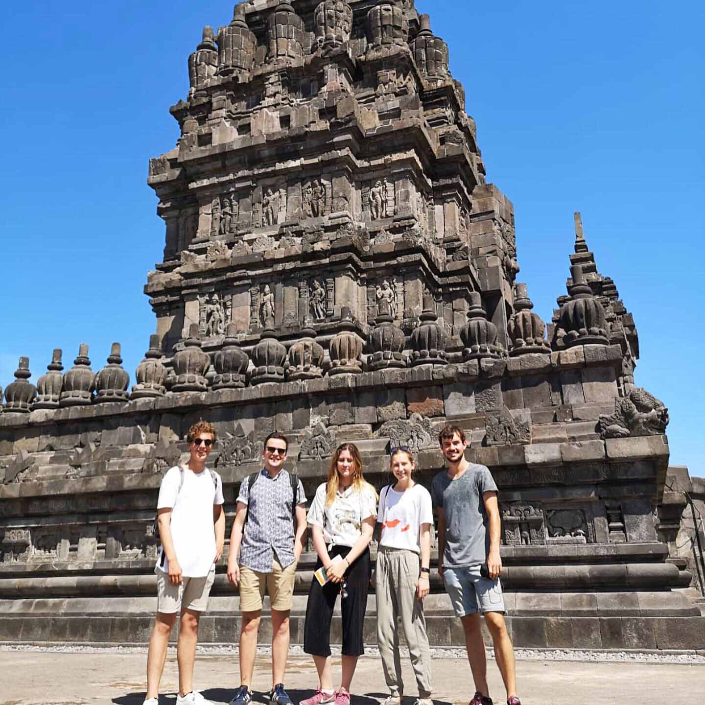 Chloe and four friends standing in front of the Prambanan Temple, a 9th century Hindu temple in Yogyakarta