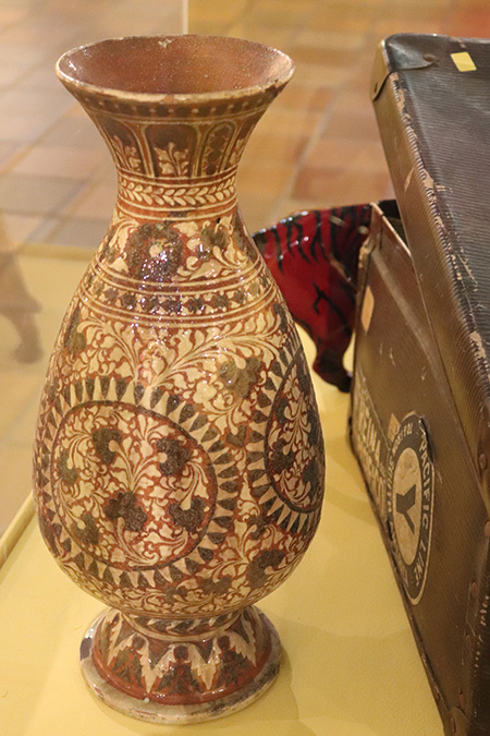 Unknown Indian artist, Red earthenware vase with floral and other designs in white slip with coating of blue glaze (19th century) The Potteries Museum & Art Gallery STKMG:CER2527. Photo Credit: The Potteries Museum & Art Gallery