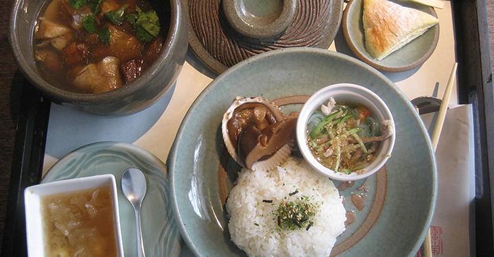 selection of traditional taiwanese food including dumplings and soup