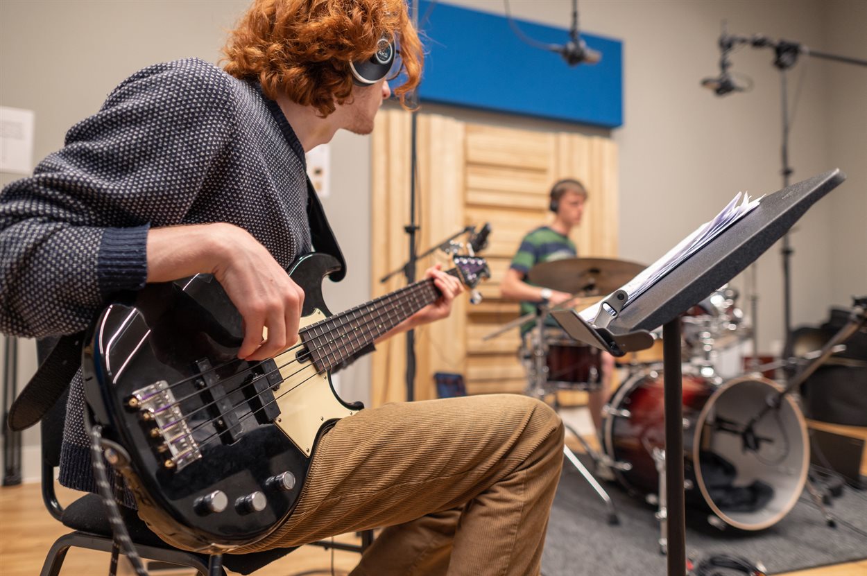 Musicians being recorded in the University Music Hub recording studio.