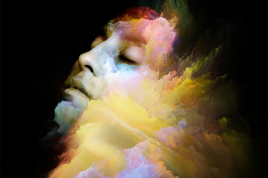 Digital image of a woman's face looking up, but eyes closed, with coloured clouds all around her