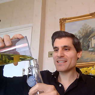 Dr Chris Laoutaris filling a bottle