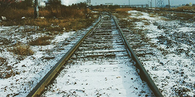 Close-up of railway track in snowy weather