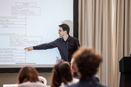 man pointing at presentation slides