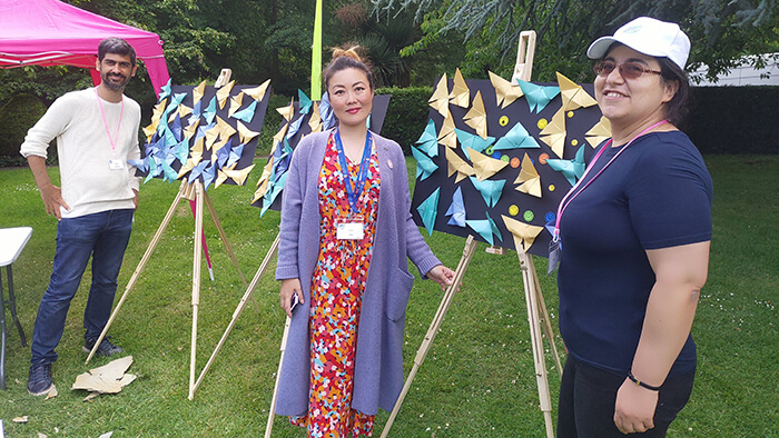 Artist Coco Sato (centre) with University of Birmingham mathematicians at the Malvern Festival