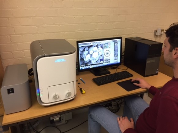 A technician using a Laser 3D scanning and material characterisation facilities