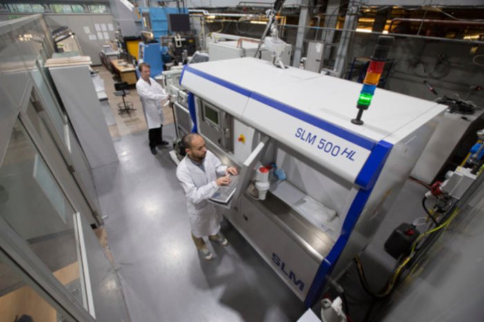 Researchers working on the SAMULET 3.4 Selective laser melting (SLM) project