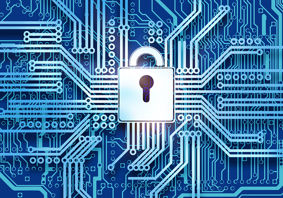 Image of padlock and computer circuit board symbolising encryption and cybersecurity