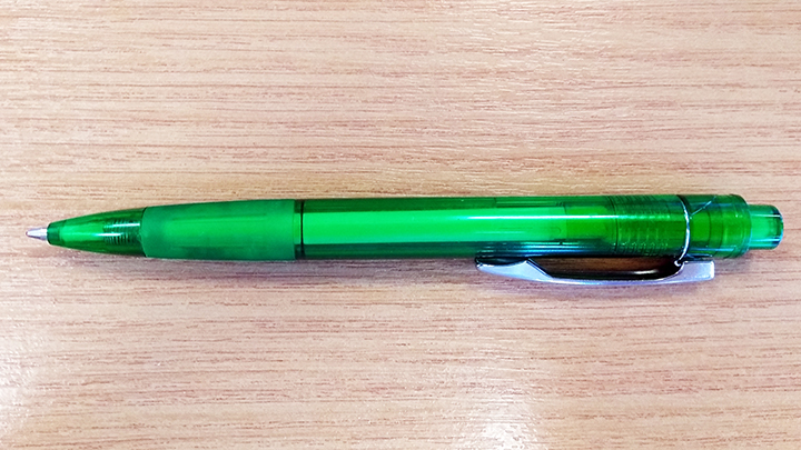 Green ballpoint pen with rubber grip