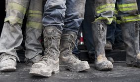 Muddy workmen boots