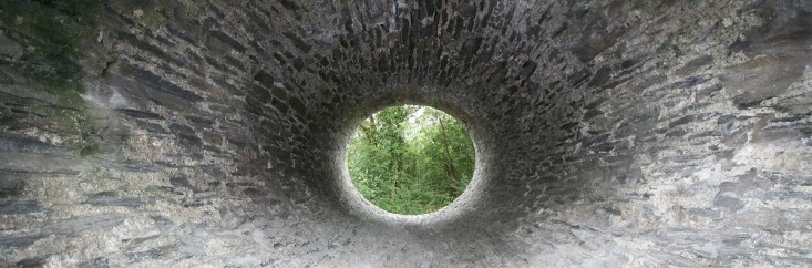 Decorative image of a stone tunnel
