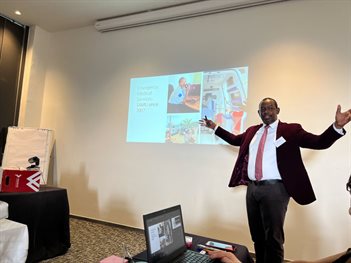 man giving a slide presentation