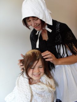 mother and child actors portraying the first child with a scalded head