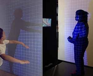 A public art installation demonstrating the effect of mirroring with a projector.