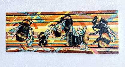 Artwork on a wall of five bees.