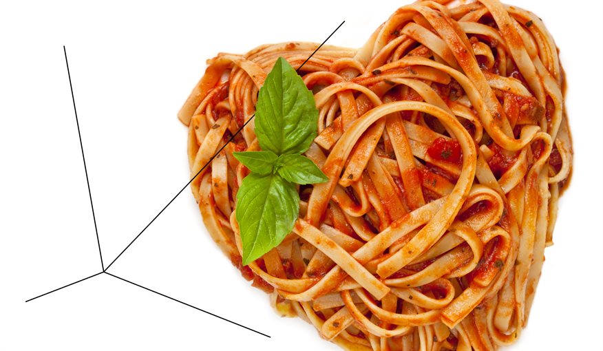 Linguine covered in a tomato sauce with a basil leaf on top 