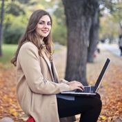 person-sat-on-bench-with-laptop-900px-min