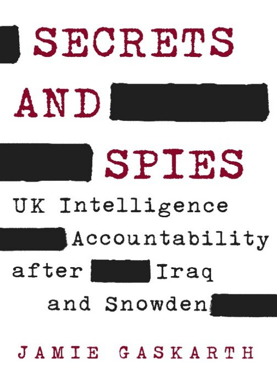 Secrets and Spies book cover depicting text with blacked out areas