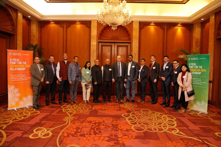 Vice-Chancellor Professor Sir David Eastwood standing with representatives of partner organisations at the signing ceremony in Delhi.