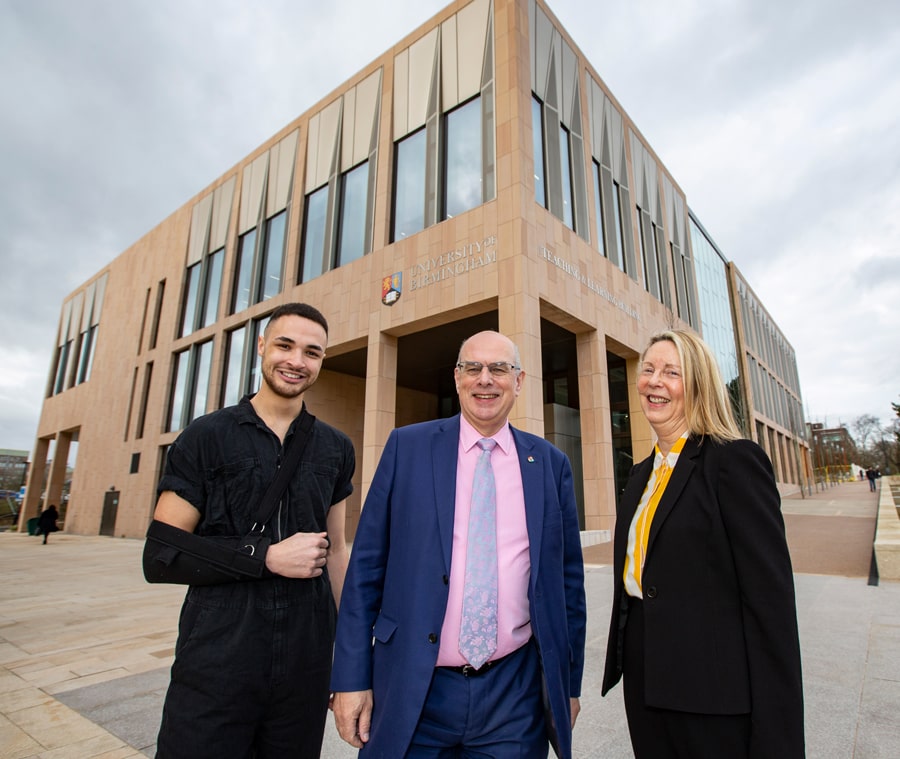 Guild President, Joshua Williams; Professor Sir David Eastwood and Professor Kathy Armour stand before the Teaching and Learning Building