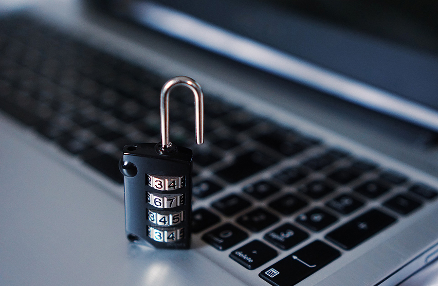 A padlock on a computer keyboard