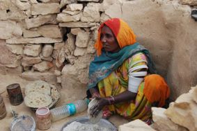 Woman cooking chapatis