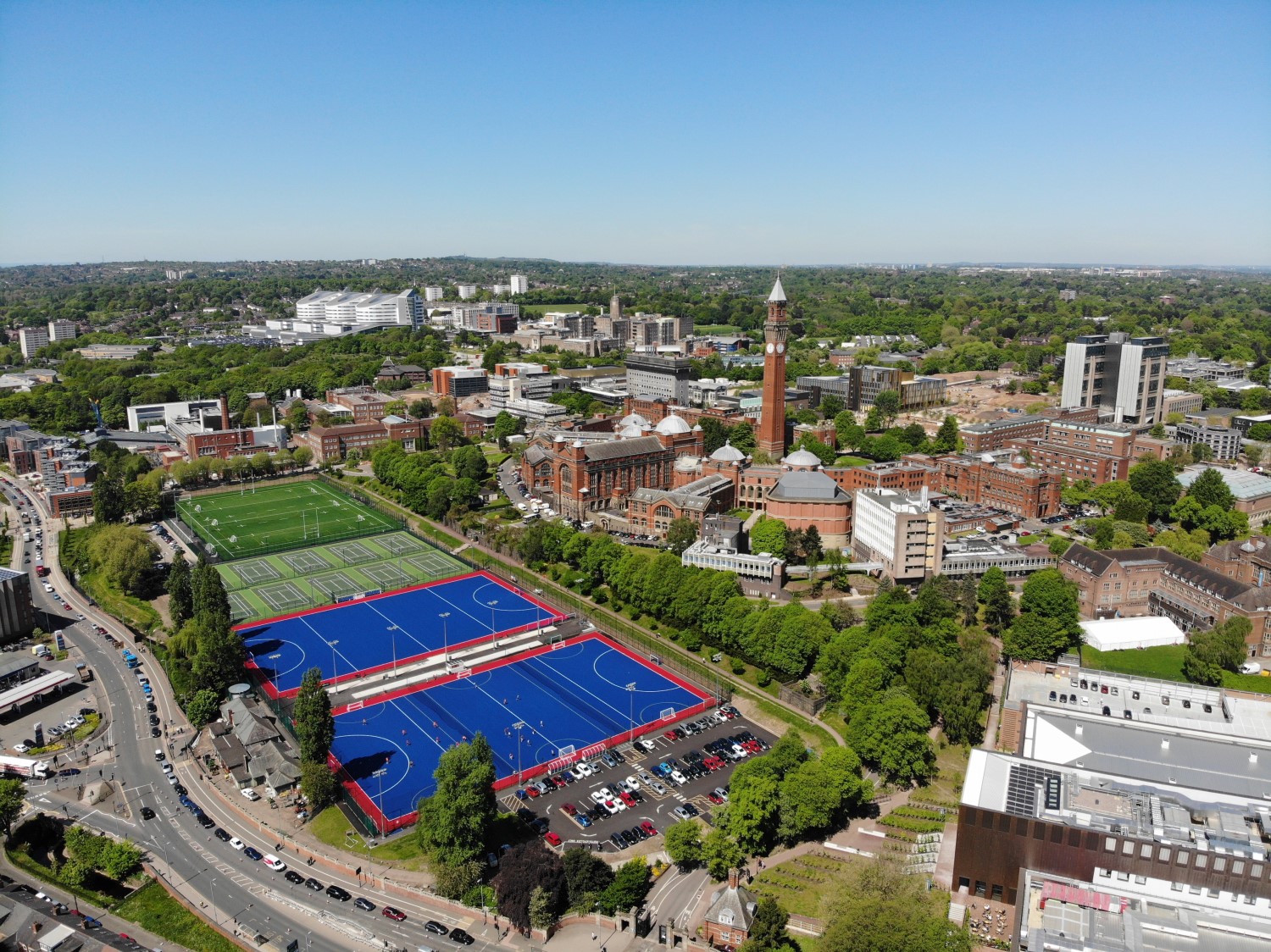 Aerial shot of the University of Birmingham's Edgbaston campus, with the sports centre and Metchley Lane pitches in the foreground.