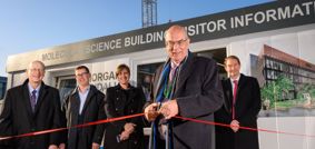 Vice Chancellor David Eastwood cuts ribbon in front of Molecular Sciences Visitor Centre