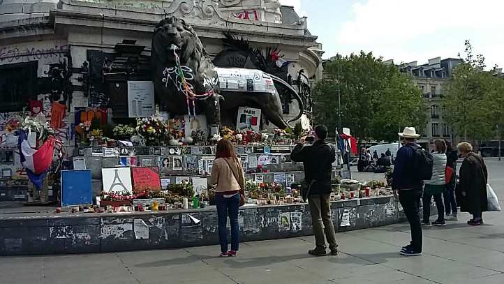 Photo showing people gathered at the terrorism memorial in Place de la Republique