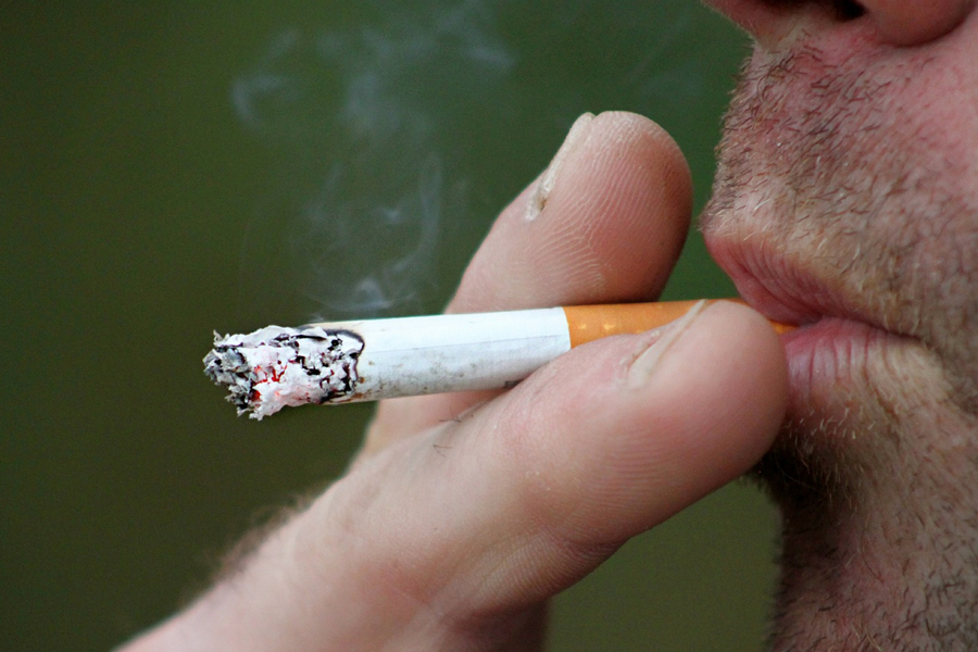 Close up of someone smoking a cigarette
