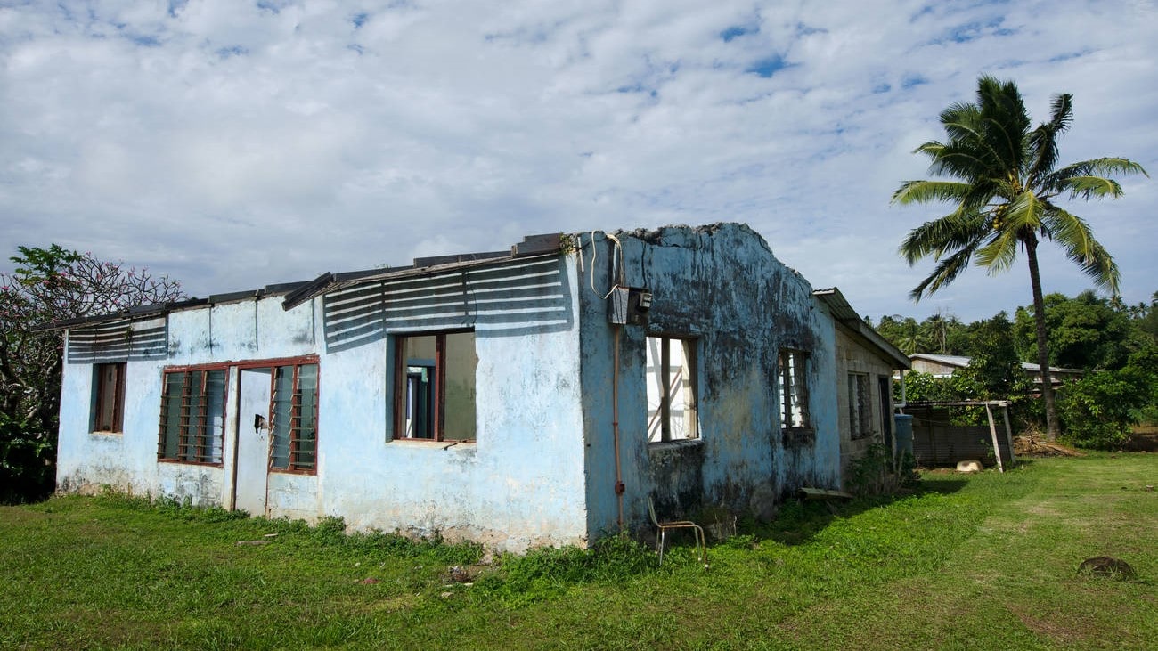 Destroyed house from Cyclone Pat in Aitutaki lagoon Cook Islands