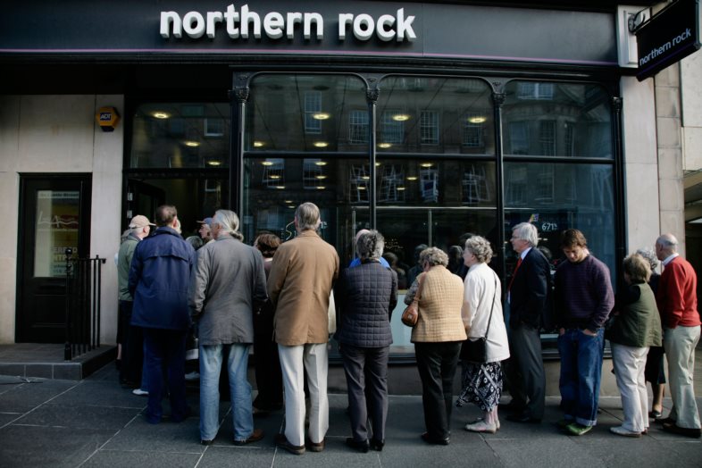 Customers queueing outside a branch of Northern Rock