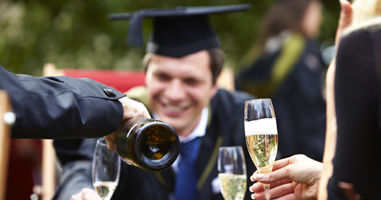 Graduates enjoying some champagne