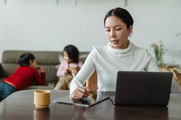 woman working from home with children