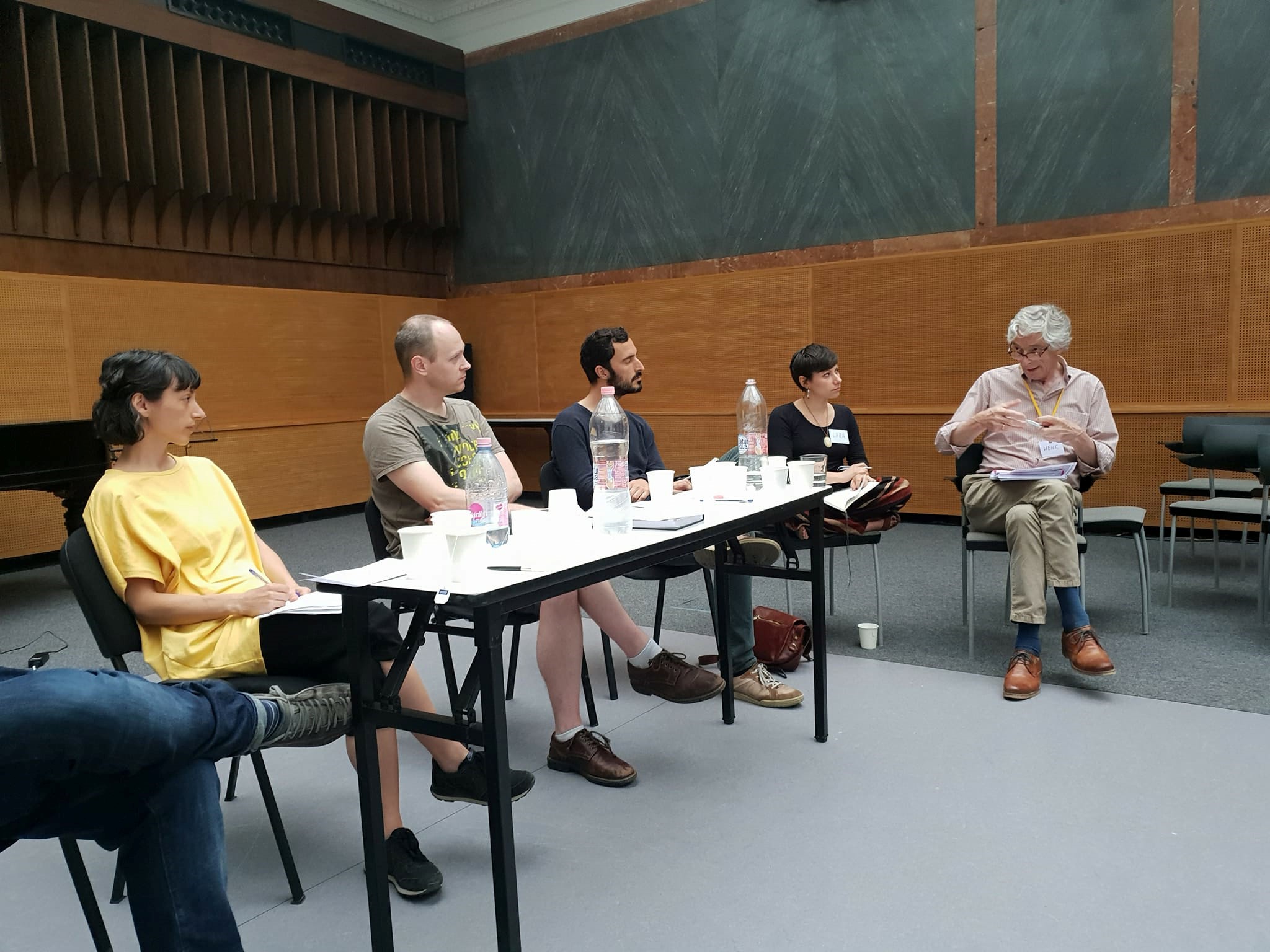 Academics sitting around a table at the seminar series