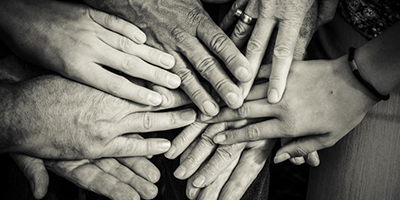 A collective group of peoples hands
