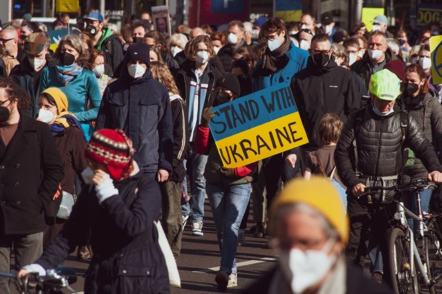 A group of people protesting about the invasion of Ukraine