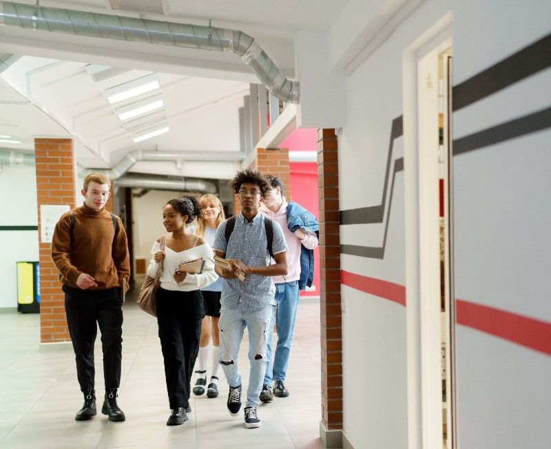 high school students in corridor