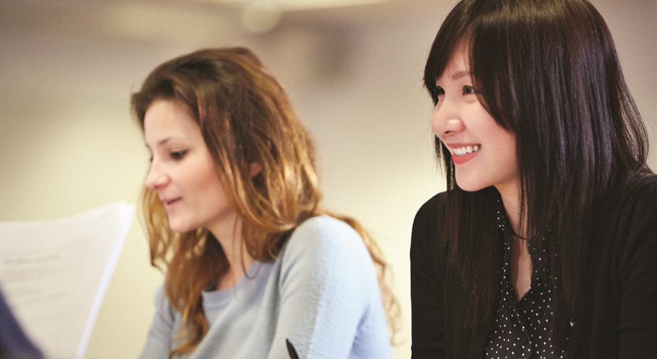 Two female students studying