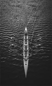 Five men in a rowing boat